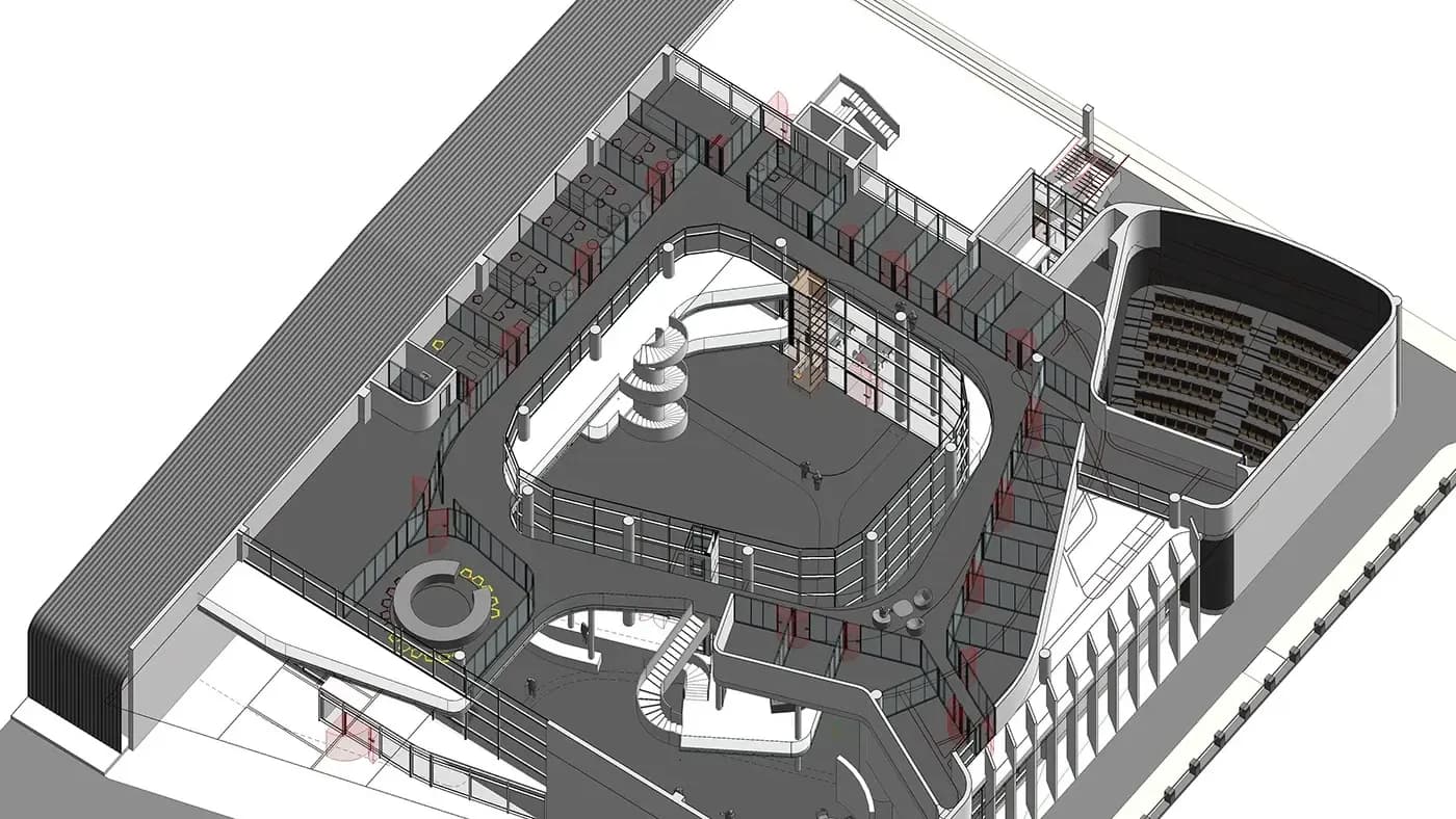 BIM model of a building cut open above the first floor, with an atrium and offices